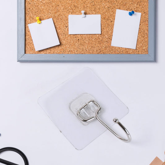 Transparent stainless steel wall hooks ideal for organizing cork boards and paper notes
