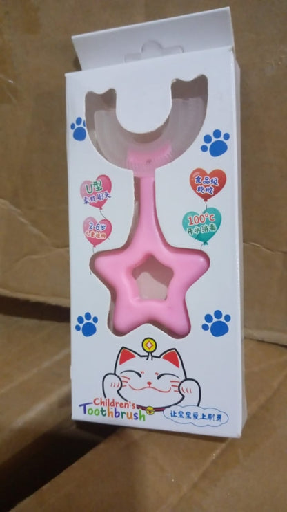 U-shape silicone toothbrush for kids in pink, packaged with a star design for easy grip
