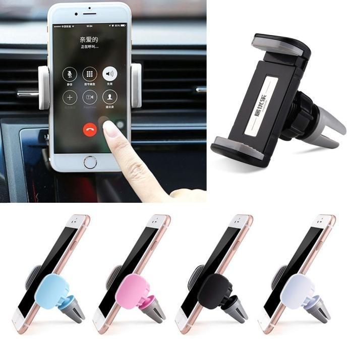 Universal car air vent phone holder in various colors, securely mounted with a smartphone in use