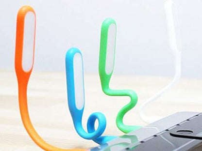 Set of three colorful USB LED light lamps in orange, blue, and green for computers and accessories