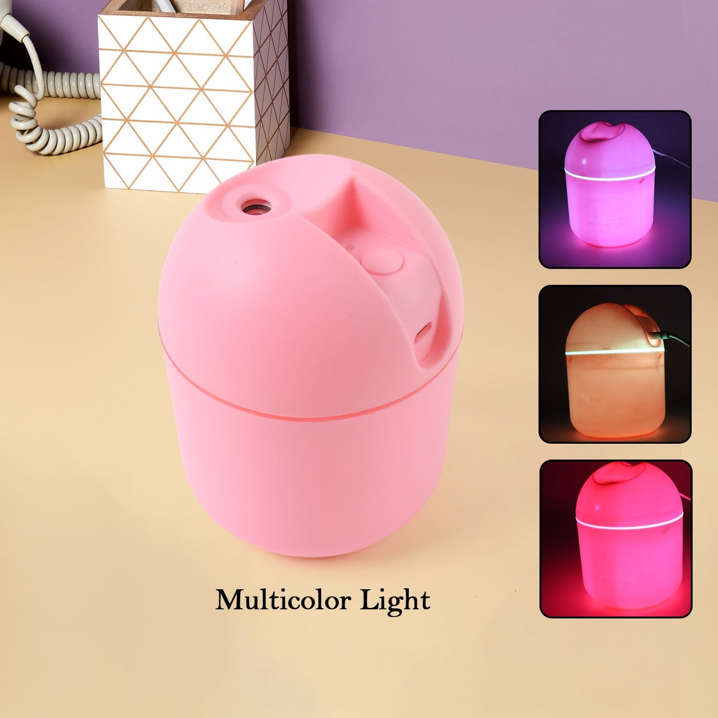 Pink USB mini air humidifier with multicolor light feature perfect for home or office use