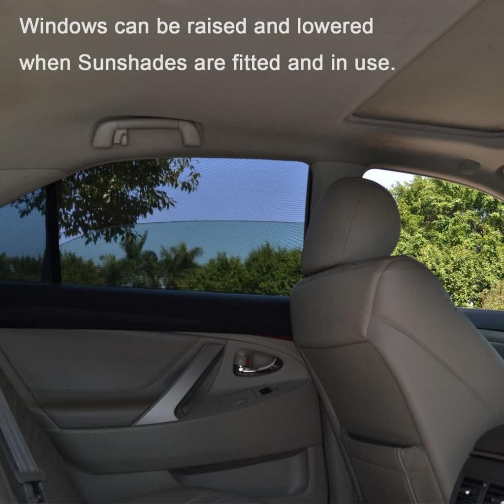 Interior view of a car with UV protection mesh curtain fitted on the windows for sunshade