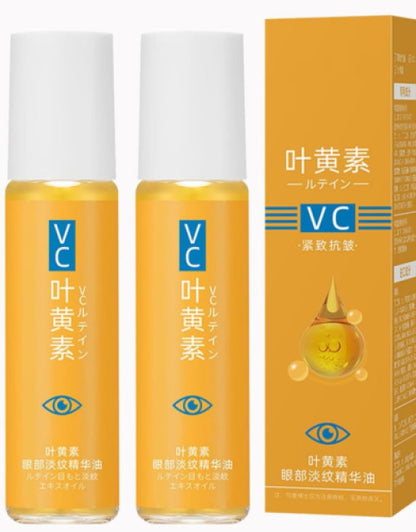The Gir Farmer anti-aging eye treatment oil in two small orange bottles with white caps and matching orange box