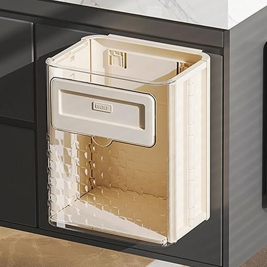 The Gir Farmer foldable wall mounted trash can in beige attached to kitchen cabinetry
