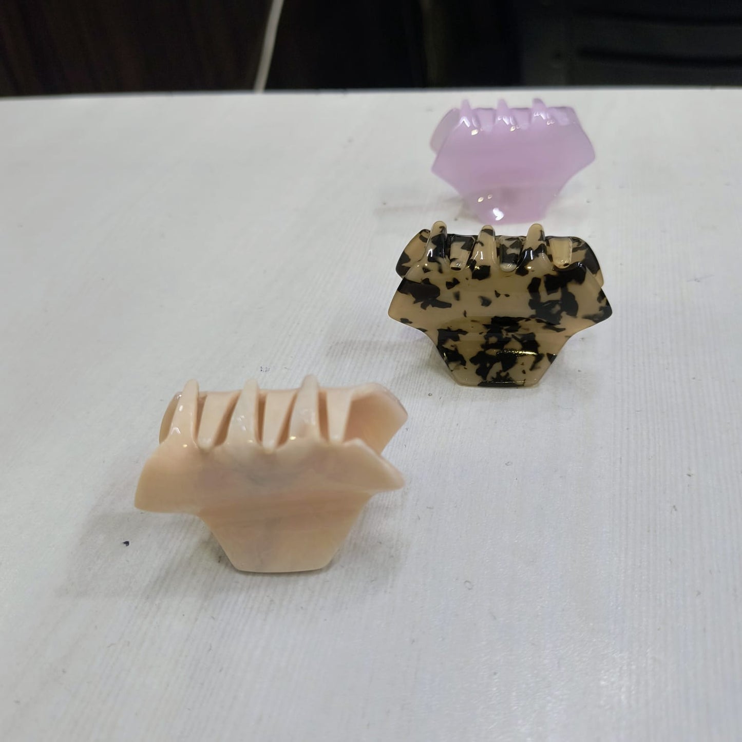 Amd-Deodap small hair claw clips for women in beige, black spotted, and translucent purple colors