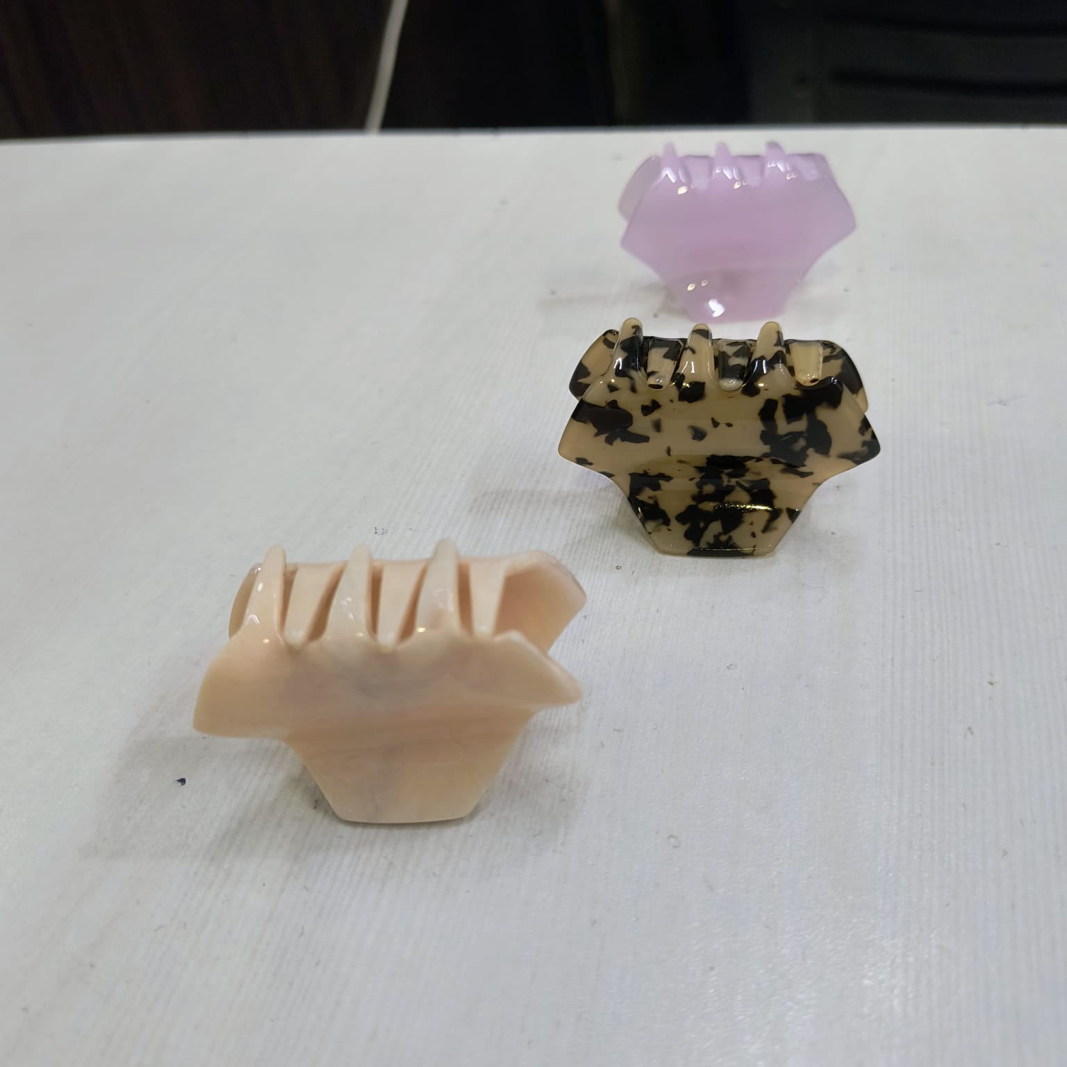 Amd-Deodap small hair claw clips for women in beige, black spotted, and translucent purple colors