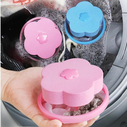 Washing machine lint catcher in pink and blue flower shapes, designed to capture lint during laundry