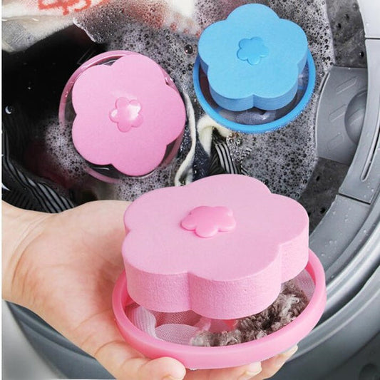 Washing machine lint catcher in pink and blue flower shapes, designed to capture lint during laundry