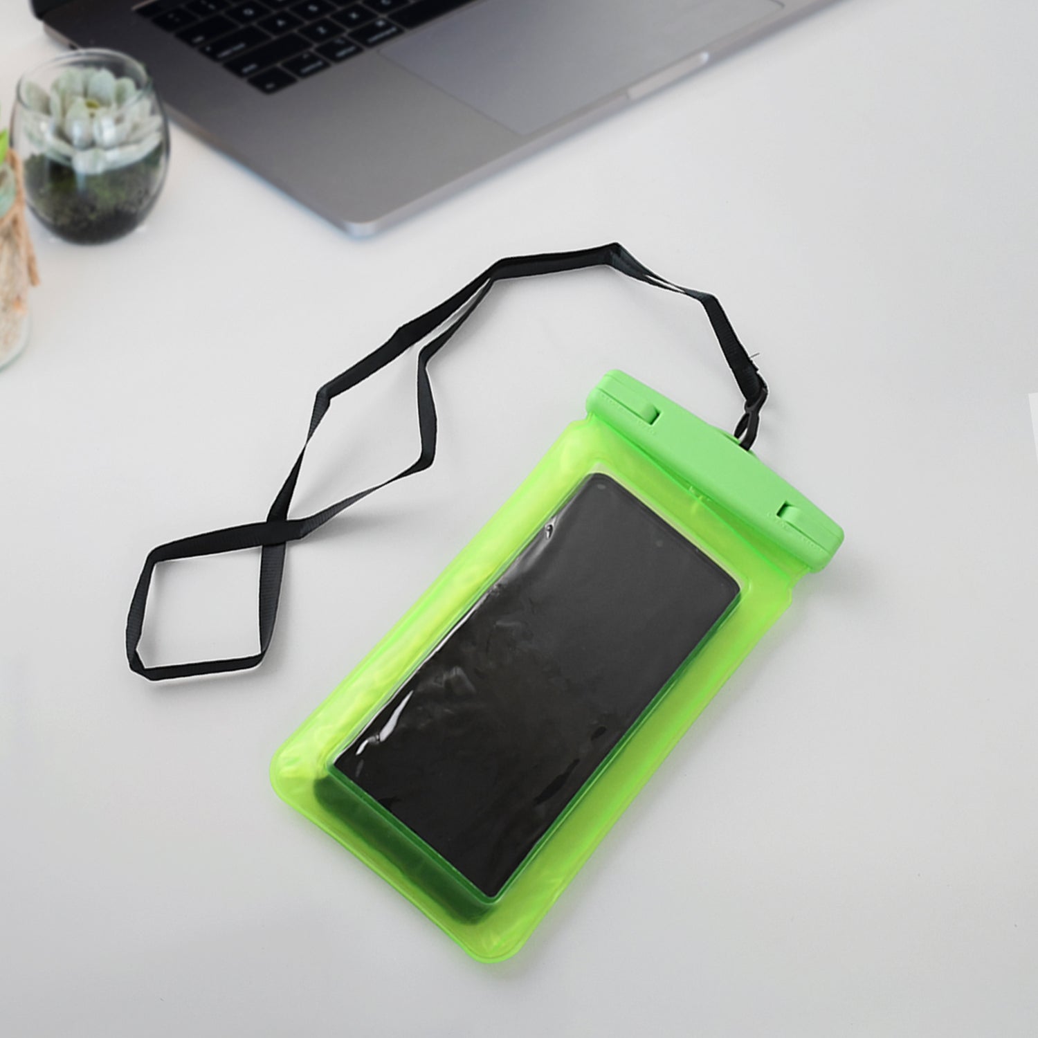 Bright green waterproof phone pouch for swimming with adjustable strap for easy carrying