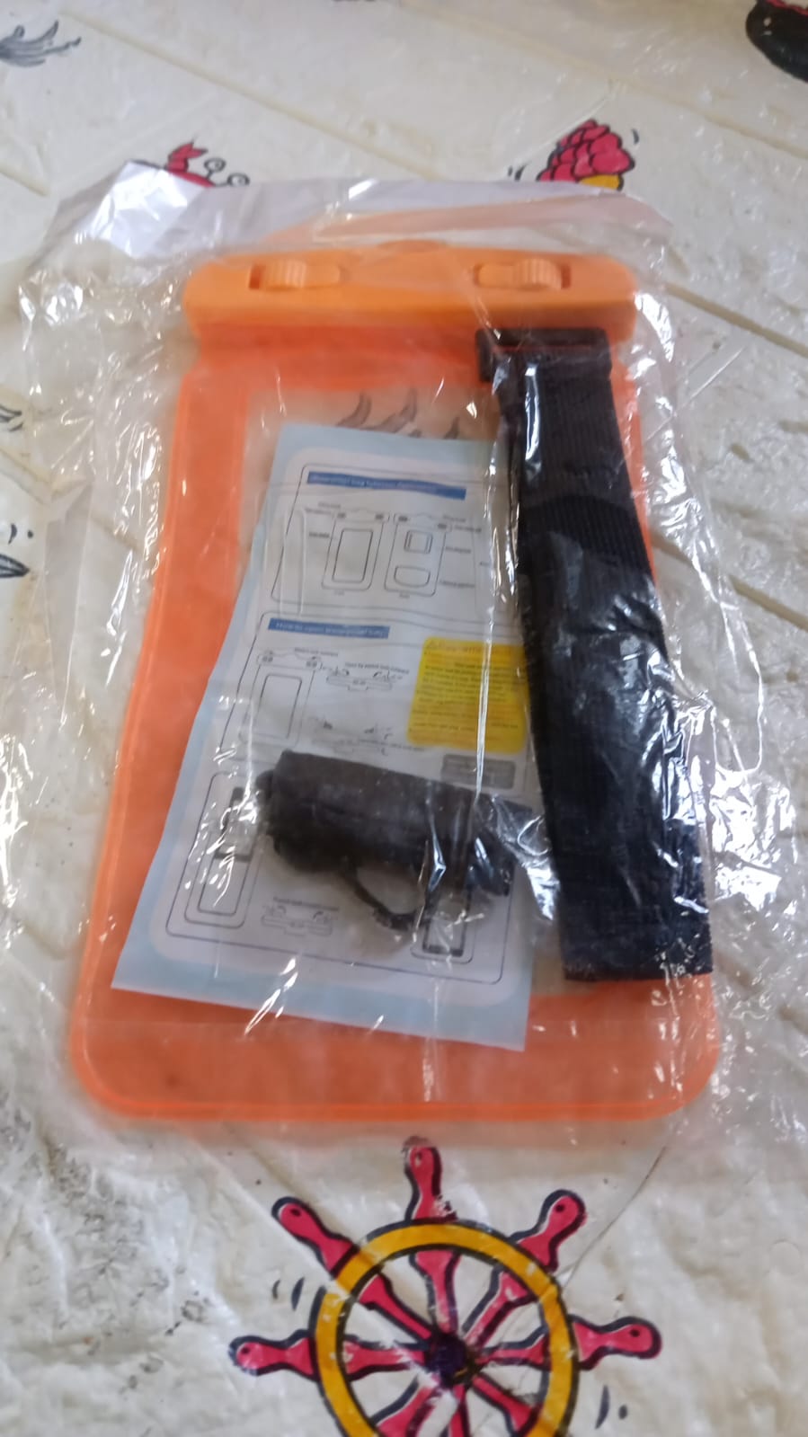 Your Brand waterproof phone pouch for swimming with adjustable strap and user guide inside plastic packaging