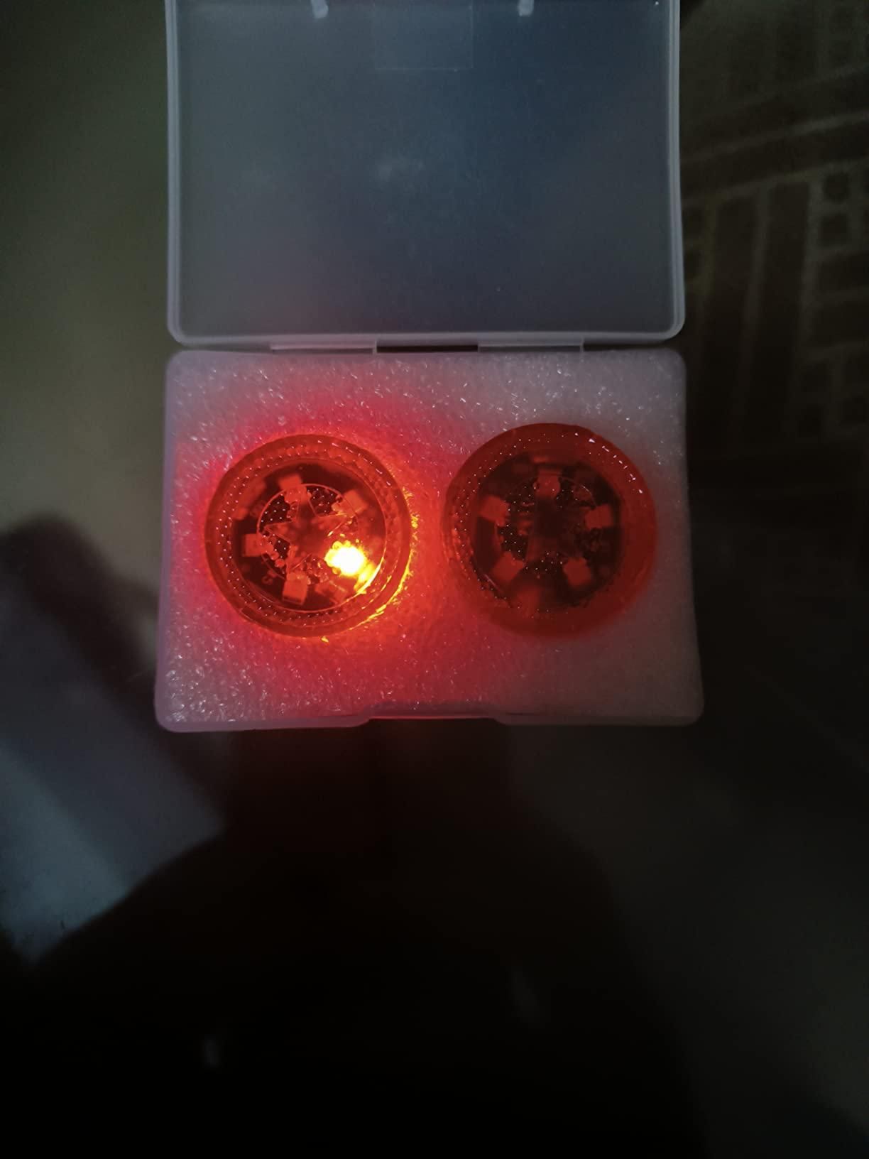 Set of wireless car door warning lights in a protective case with red illumination for vehicle safety