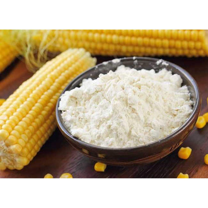 The Gir Farmer Organic Corn Flour in a bowl with fresh corn on the cob for purchase organic corn flour online
